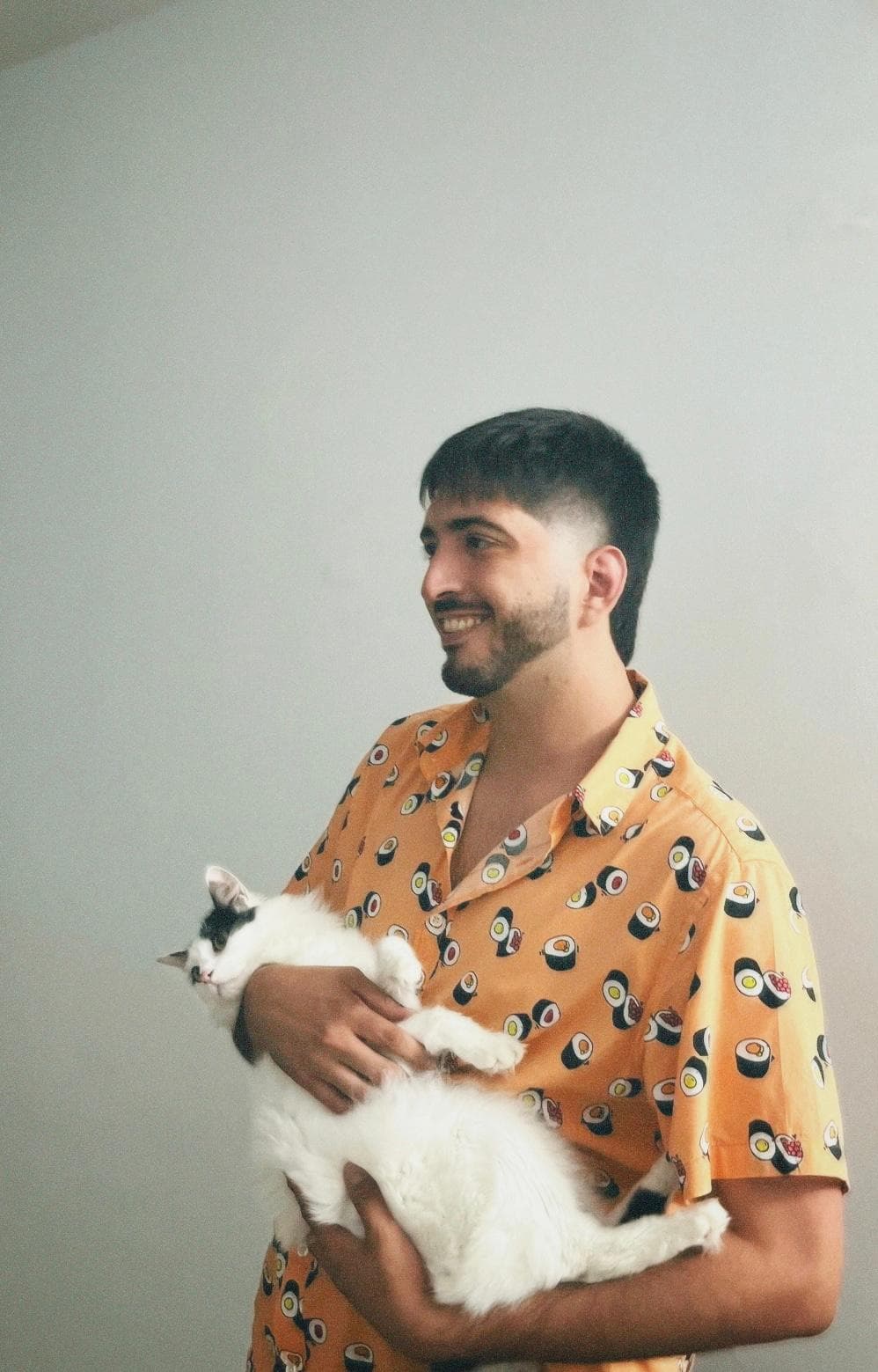 Jose Miguel with his cat